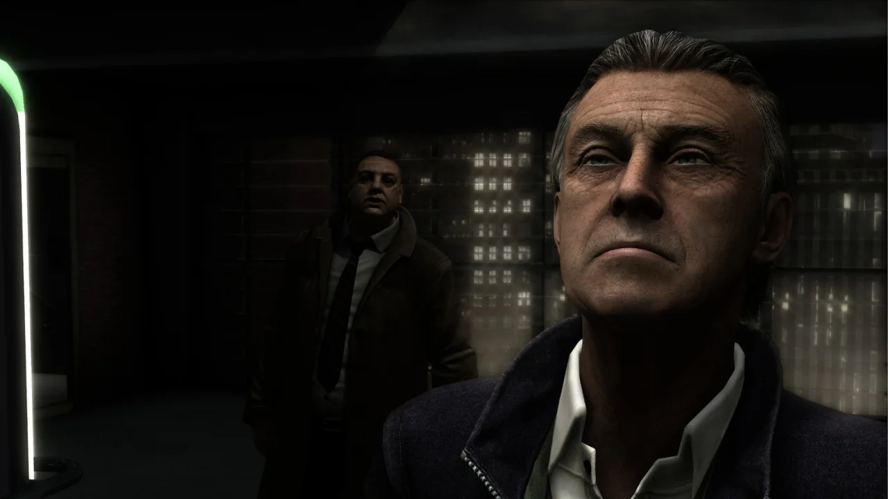 Two realistic male characters in a dimly lit scene. An older man in the foreground, looking up, with a younger man in the background.