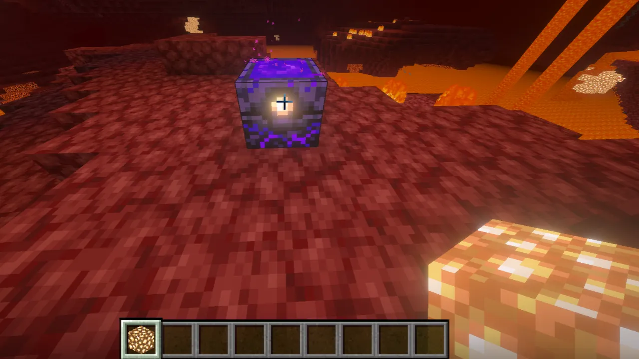 Minecraft Nether dimension screenshot, featuring a Crying Obsidian block, lava pools, and Glowstone in the player's hotbar.
