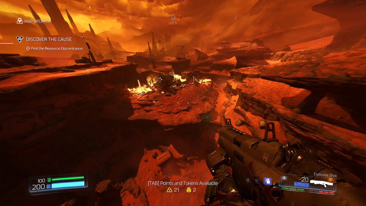DOOM 2016 Mars level exploration gameplay showing the Doom Slayer moving through a red outdoor environment.
