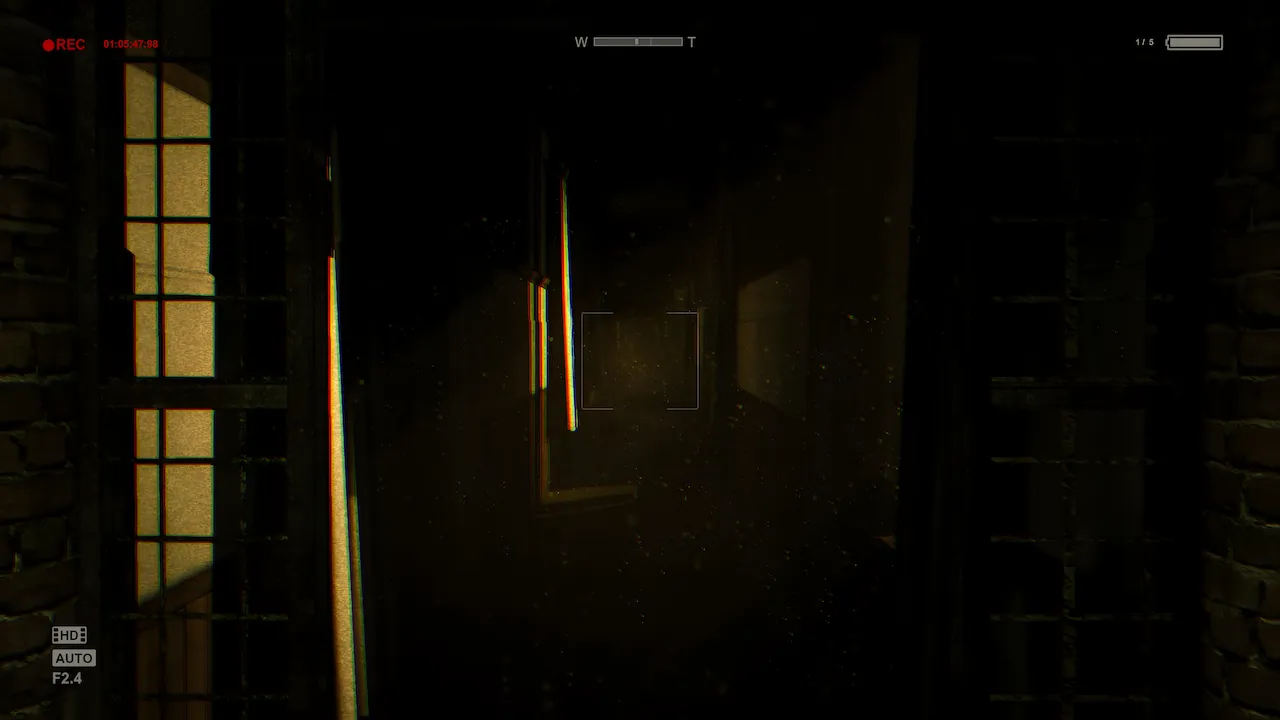 Survival horror game screenshot through a camera lens with night vision HUD and a dark hallway view.